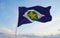 flag of Mato Grosso , Brazil at cloudy sky background on sunset, panoramic view. Brazilian travel and patriot concept. copy space