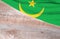 Flag Mauritania and space for text on a wooden background