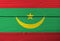 Flag of Mauritania on wooden wall background. Grunge Mauritania flag texture.