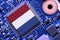 Flag of Netherlands on a processor, CPU Central processing Unit or GPU microchip on a motherboard