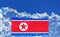 The flag of North Korea is painted on piece of ice in the form of an arctic iceberg against a blue sky. Closed policy, cold war