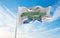 flag of Nunatsiavut , Canada at cloudy sky background on sunset, panoramic view. Canadian travel and patriot concept. copy space