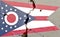 Flag of Ohio painted on an old wall with large cracks on its surface - Ohio state flag background