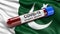 Flag of Pakistan waving in the wind with a positive Covid-19 blood test tube. 3D illustration concept.