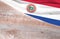 Flag Paraguay and space for text on a wooden background