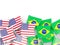 Flag pins of USA and Brazil on white