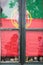 The Flag of Portugal in window in Faro city