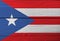 Flag of Puerto Rico on wooden wall background. Grunge Puerto Rico flag texture.