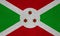 Flag of Republic of Burundi on a textured background. Concept collage