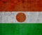 Flag of Republic of Niger on a textured background. Concept collage