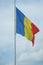 The flag of Romania waving. photo during the day.