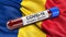 Flag of Romania waving in the wind with a positive Covid-19 blood test tube. 3D illustration concept.