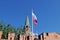 Flag of Russia against Troitskaya Tower of the Moscow Kremlin