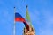 Flag of Russia against Troitskaya Tower of the Moscow Kremlin