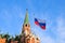 Flag of Russia against Troitskaya Tower of the Moscow Kremlin