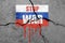 Flag of Russia painted on concrete wall with word STOP WAR . Russian military aggression