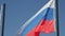 Flag of Russian Federation against blue sky