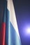 Flag Russian Federation on dark background in flash cameras, tricolor banner patriot Russia