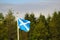 Flag of Scotland against nature background