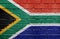 Flag of South Africa on brick wall