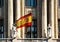 Flag of spain, from a neoclassic building, madrid