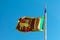 Flag of Sri Lanka with old flag pole