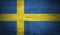 Flag of Sweden on grungy wood