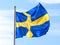 Flag of Sweden waving against sky