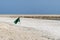 Flag swimming danger sign at beach souly bay salalah Oman