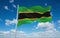 flag of Tanganyika 1961 1964, africa at cloudy sky background, panoramic view. flag representing extinct country,ethnic group or