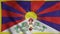 Flag of Tibet waving in wind. Realistic Tibet flag background