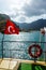 Flag of Turkey in the tail of a tourist yacht on the Aegean Sea