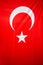 Flag of Turkey on wooden plate background. Grunge Turkish flag texture, a red field with a white star and crescent slightly left