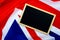 Flag of UK, British flag with blackboard, close up. Top view, copy space for text