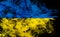 Flag of Ukraine in smoke