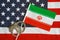 Flag of USA and Iran. Handcuffs. Sanctions