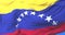 Flag of Venezuela waving at wind in slow with blue sky, loop