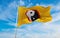 flag of Yinyang ren waving in the wind at cloudy sky. Freedom an