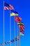 Flags against blue sky