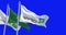 Flags of Aramco and Saudi Arabia waving on a blue background