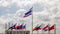 Flags of Asian states fly near the Royal Thai Mint building in Bangkok, Thailand