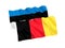 Flags of Belgium and Estonia on a white background