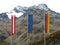 Flags of border area in alpine landscape