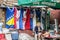 Flags of Bosnia and Herzegovina, Serbia, Croatia and Yugoslavia on display on a market in the district of Brcko