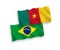 Flags of Brazil and Cameroon on a white background