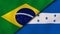 The flags of Brazil and Honduras. News, reportage, business background. 3d illustration