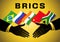 Flags of the BRICS countries on yellow background