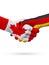 Flags Canada, Germany countries, partnership friendship handshake concept.
