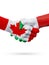 Flags Canada, Italy countries, partnership friendship handshake concept.