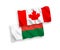Flags of Canada and Madagascar on a white background